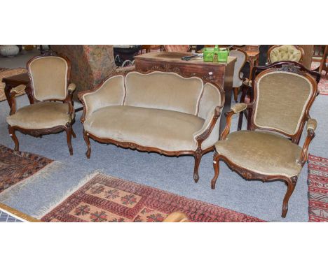 A 19th century three piece salon suite, comprising a sofa and a pair of chairs
