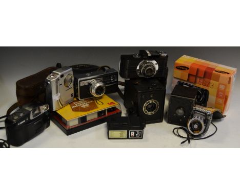 Cameras - an Argus camera;  a Kodak Brownie;  Kodak Instamatic; etc