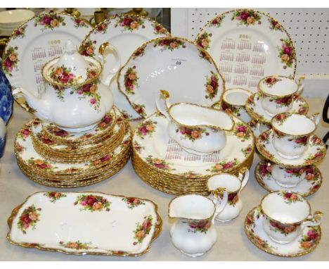 A Royal Albert Old Country Roses dinnerware for six, tea service for four ;  a set of eleven calendar plates