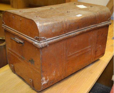 An early 20th Century metal steamer trunk with carrying handles