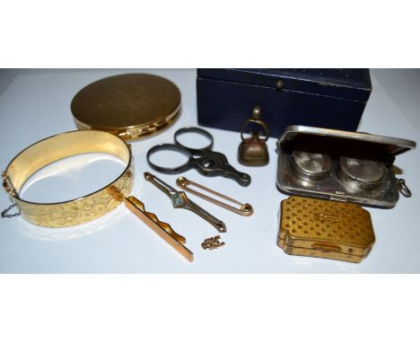 A gold plated hinged bangle;  a Regency compact;  a sovereign purse;  a seal;  etc 