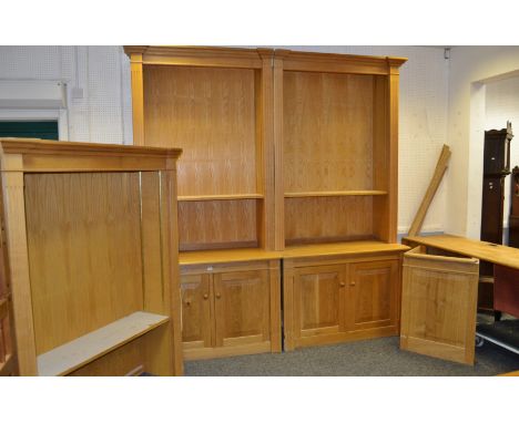 A bespoke light oak Library panelling including bookcases, desk, filing drawer;  etc 