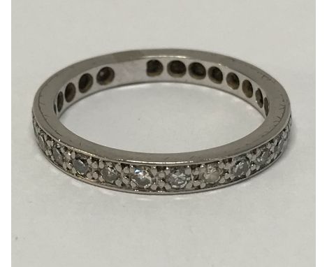 A white gold diamond eternity ring, total weight 5g (not tested)