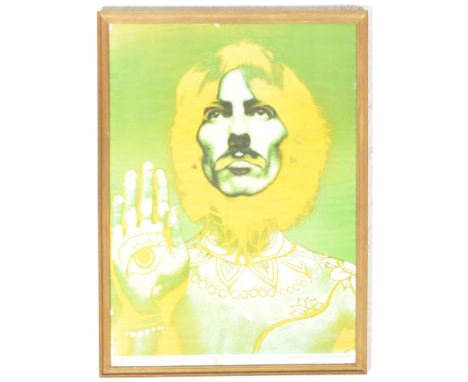 A vintage 1960s Beatles Poster of George Harrison by Richard Avedon. First Edition Prints issued by the Daily Express publish