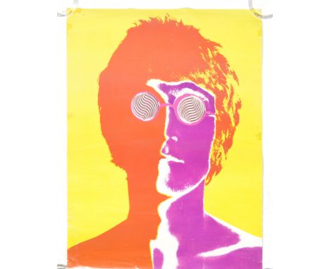 A vintage 1960s Beatles Poster of John Lennon by Richard Avedon. First Edition Prints issued by the Daily Express published i