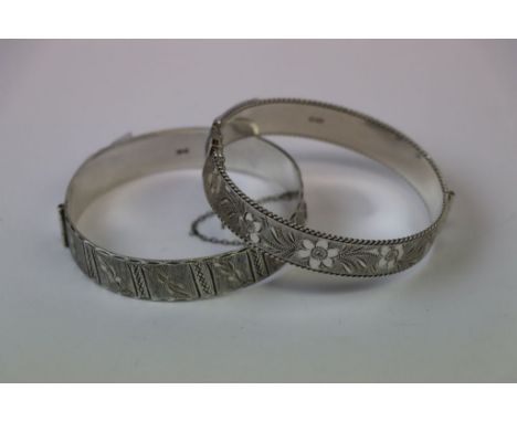 Two Hallmarked Silver Bangle type bracelets with chased Engraving