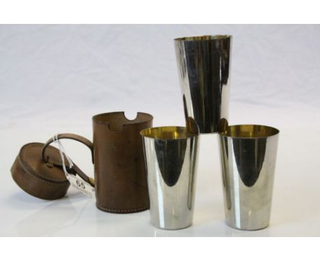 Set of Three Silver Plated Stacking Hunting Stirrup Cups with Gilt Lining contained in a Brown Leather Stitched Case