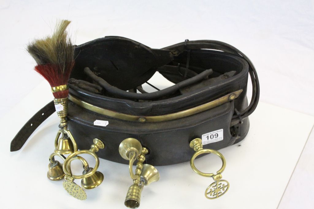 Antique leather horse collar with swinger type horse brasses to include