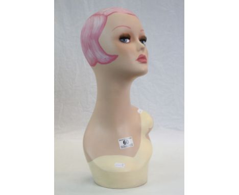 Art Deco style mannequin head, with pink hair and pink lips, stands approx. 45 cm
