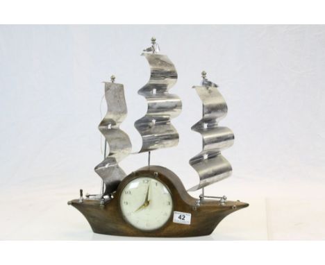 Art Deco ' Smiths ' Teak 8 Day Mantle Clock in the form of a Boat with Three Chrome Sales, 44cms high