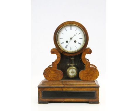 Key wind 19th Century Walnut veneer Mantle clock with Enamel dial and glazed viewing panel to for the Pendulum, stands approx