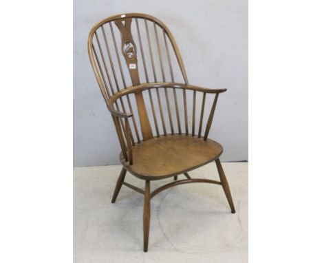 Ercol swan back Windsor armchair with crinoline stretcher 