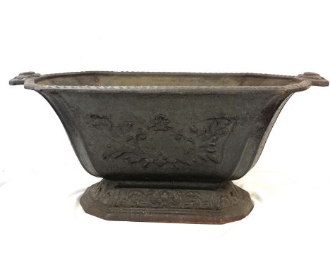 Cast iron coal bucket / planter, approximate measurements: approximate measurements:&nbsp; Height 10 inches, Width 24 inches,