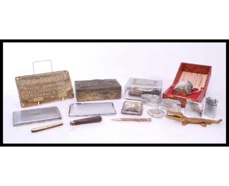 A good collection of vintage cigarette lighters and cases to include silver hallmarked damaged case, Chinese white metal tabl