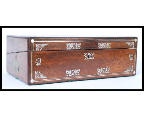 A 19th century Victorian rosewood and mother of pearl inlaid writing slope box. The box&nbsp; having mother of pearl inlay an