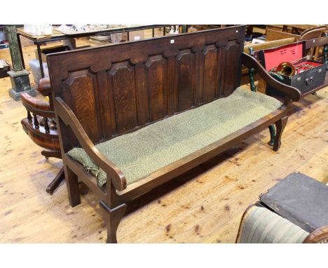Antique oak fielded six panel back settle