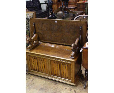 Marcus Limited carved oak linen fold panel front monks bench