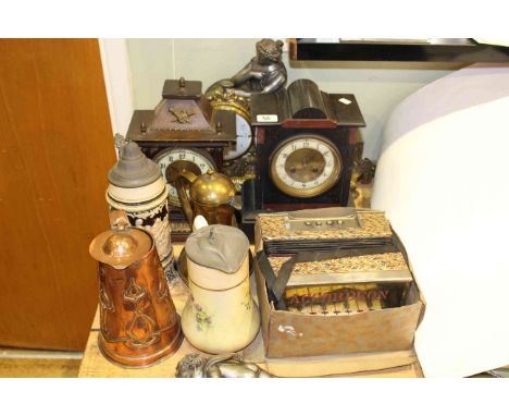 Three Victorian mantel clocks, Art Nouveau copper jugs, other jugs and toy accordion