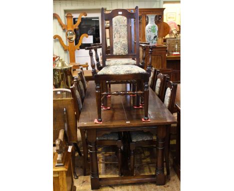 Jointed oak plank top refectory style dining table and eight tapestry panel back chairs