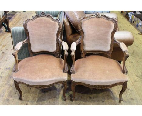 Pair of French panel back fauteuils on cabriole legs