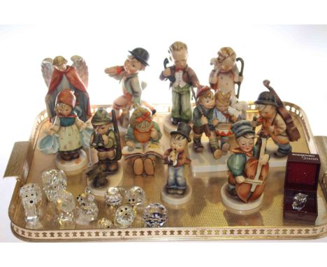 Eleven Hummel figures, Swarovski glass animals etc.