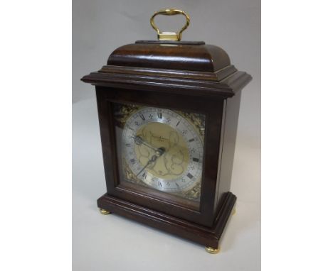 A 20th Century mahogany cased mantle clock for Asprey & Garrard, London, with Roman numerals to the silvered chapter ring and