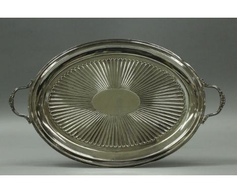 A Victorian silver twin-handled oval drinks tray with central fluted fan medallion (by Roberts & Belk, Sheffield 1898), appro