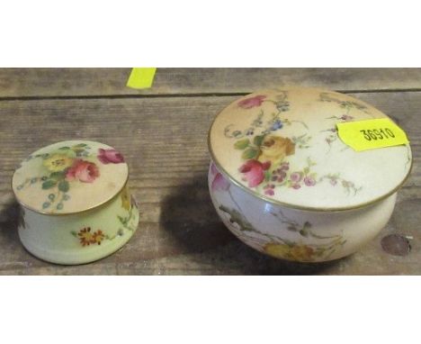 Two Royal Worcester blush ivory pots and covers, diameter 2.75ins and down