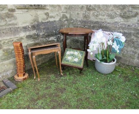 A centre table, stool with tapestry top, with needlewoman shop , London stamp, CD rack, nest of two tables, a folding tea tro