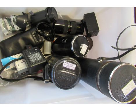 A collection of camera lenses and other items