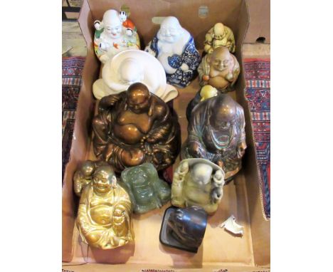 A collection of reproduction ceramic and stone Buddha's.