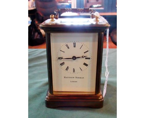 Matthew Norman, London, a 20th century bras five glass carriage timepiece, with enamel Roman dial.