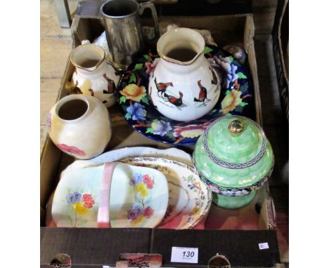 A box of decorative ceramics, to include: a Malling covered jar, two Ashworth Brothers jugs, each decorated with cock fightin