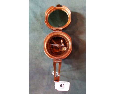 A brass cased surveyor's compass, stamped Stanley, London.