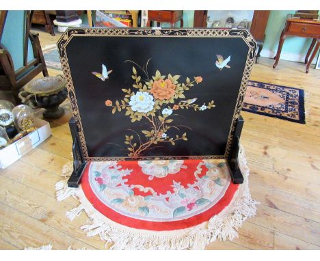 A reproduction Chinese black lacquered painted and florally painted fire screen, 80 x 98cm.