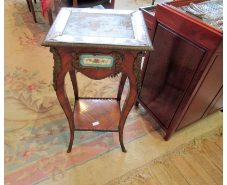 A 19th century French kingwood, gilt metal mounted and Sevres-type plaque inlaid lamp table, the square top over serpentine f