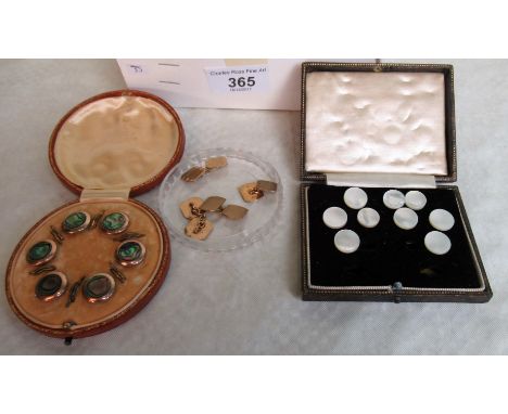A pair of 9ct gold cufflinks, round rectangular engine turned, together with a set of dress buttons, a mother of pearl dress 