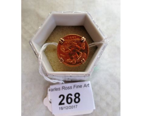 A Victorian half sovereign dated 1900, in a later ring mount. Condition Report: 7.2 grams