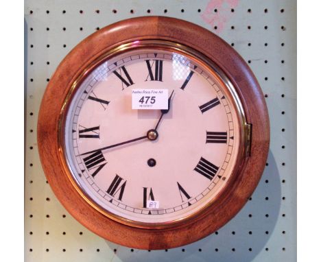 A mahogany circular cased wall clock, the eight day movement faced by enamel Roman 8" dial.