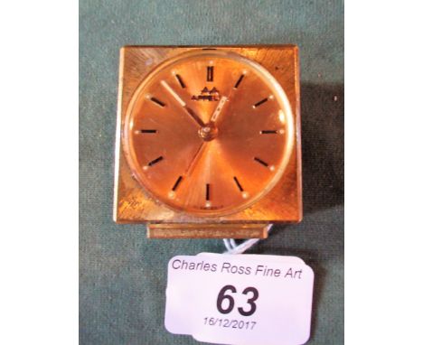 A mid-20th century Appella gilt cased travelling alam clock.