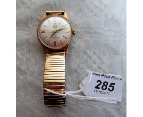 Rolex: A gentleman's Rolex Tudor Royal 9ct gold wristwatch, brushed champagne dial, to baton numerals and sweep seconds hand,