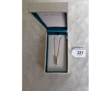 A diamond set ladder-style pendant, the baguette diamonds between single cut diamond borders, mounted, marked 14k.