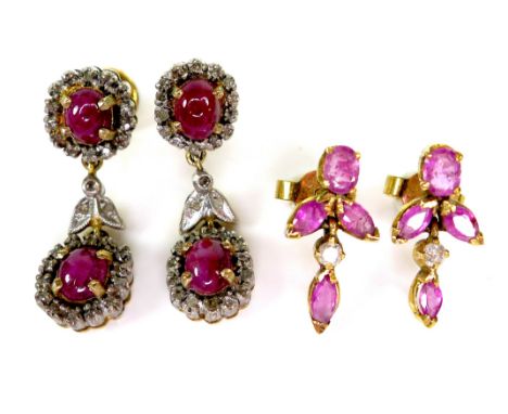 Two pairs of gold and ruby drop earrings, both unmarked but test as 9ct, 7.7g combined. (2) 