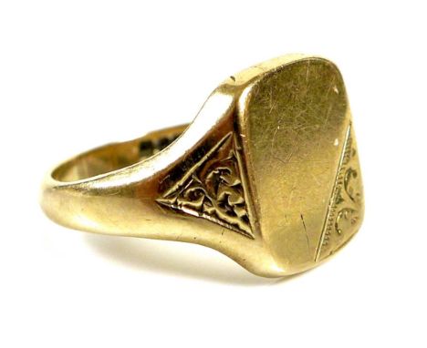 A 9ct gold gentleman's signet ring, the blank cartouche with foliate engraved corner and shoulders, 14 by 12mm, HG, Birmingha