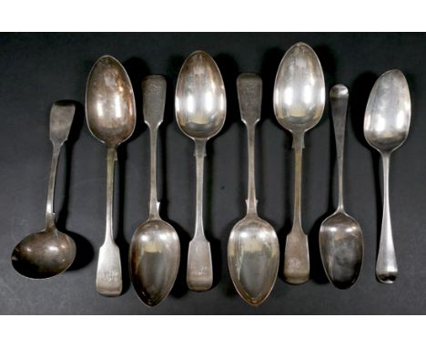 A group of Georgian and later tablespoons, comprising five fiddle pattern with engraved terminals, 22cm long, and two Hanover