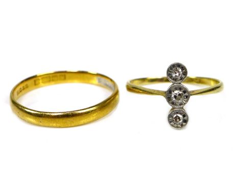 A 22ct gold ring, size Q/R, 2.3g, together with a gold three stone diamond ring, the illusion set round cut diamonds of gradu