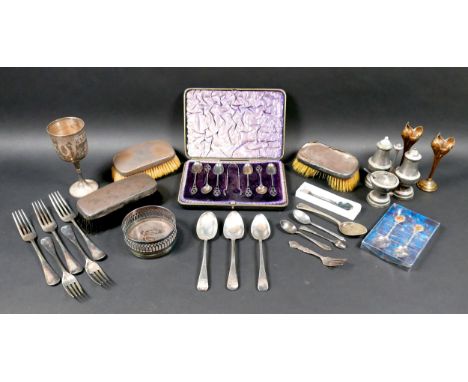 A small group of silver and silver plated items, including three Georgian silver dessert spoons, a cased Edwardian silver cof