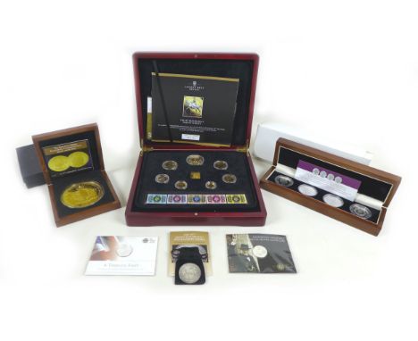 A collection of ERII silver proof and other coin sets, including a limited edition London Mint Office 1977 silver Jubilee Maj