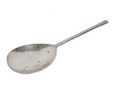 An early to mid 17th century silver slip top spoon, with pear shaped bowl, single partial hallmark still visible, finial engr