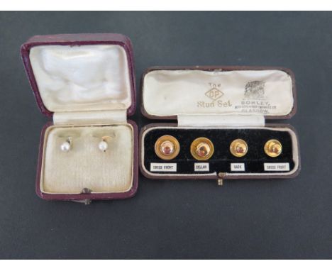 A set of four dress studs - Stamped 9ct - Weight approx 2.9gms - Together with two seed pearl dress studs - Stamped 9ct - Wei